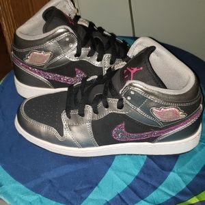 Nike Air Jordans. Youth black, silver and pink 4.5